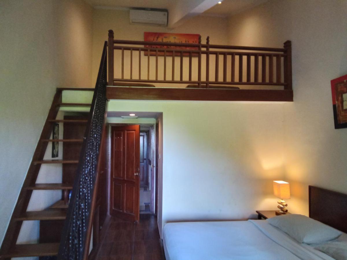 Hotel Puri Dibia Kuta Кута Екстериор снимка